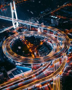 an aerial view of a city at night