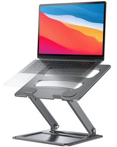 an open laptop computer sitting on top of a metal stand