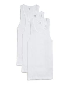 PRICES MAY VARY. Body-confident design for a lean, contoured fit Scoop neck and sleeveless construction Rib-knit tank top Extended hem Sleeveless Undershirt Tank Top, Mens Undershirts, Body Conscious, Mens Essentials, Cotton Tank Top, Fit Style, Knitted Tank Top, Knit Cotton, Knit Tanks