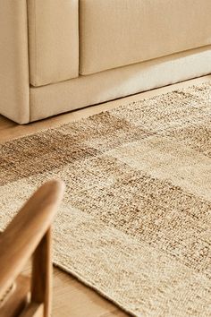 a living room scene with focus on the rug