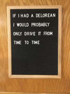 a sign that is on the side of a door saying if i had a delorean i would probably drive it from time to time