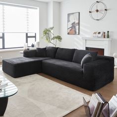 a living room filled with furniture and a fire place