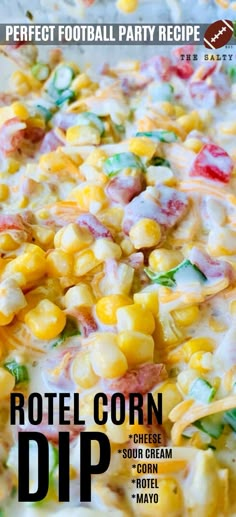 a plate filled with corn and cheese on top of a table