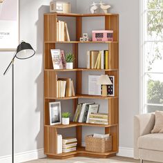 a living room with a couch, chair and bookshelf