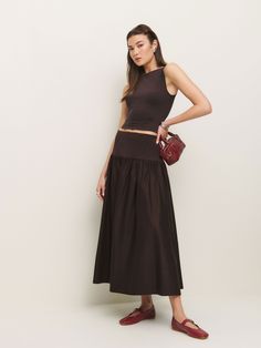 Wear the skirt. Shop the Nuria Skirt from Reformation, a mid-rise midi skirt with a drop waist. Genetically Modified, Heads Up, New Tops, Jean Skirt, Drop Waist, Mole, The Land, Skirt Pants, Vintage Collection