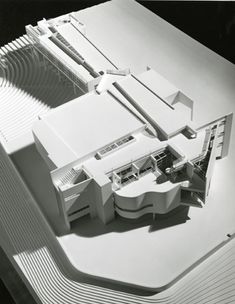 an architectural model of a building on top of a roof