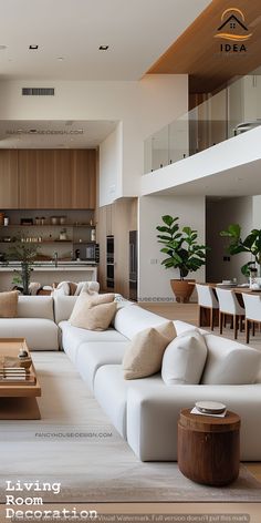 a living room filled with lots of white furniture