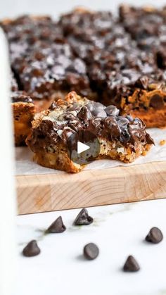 chocolate chip cookie bars on a wooden cutting board