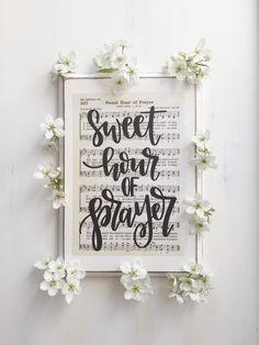 an art piece with the words sweet love is written in black and white on it