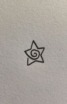 a black and white drawing of a star with a spiral on it