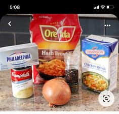 ingredients to make chicken broth sitting on a counter top next to a bag of gravy