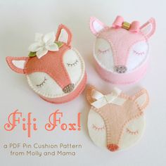 three felt fox head brooches with the words fifi foss on them