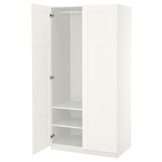 an open white closet with shelves and doors