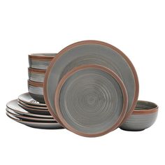 a stack of grey and brown dishes