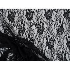 black and white lace fabric with an intricate design