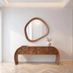 a wooden bench sitting under a round mirror on top of a hard wood floor next to a window