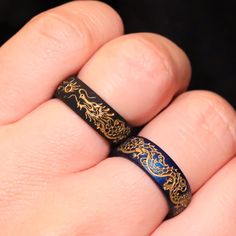 The Year of the Dragon is upon us, so at Knot Theory we set out to design the coolest dragon ring.Truth to be told, this design took 3 weeks longer than we anticipated - dragons are a complex beast! After wrestling with the dragons in a million revisions, we are happy and proud to present to you:Ring of Fire: Dragons Collection 🔥 Discover the Dragon Collection:Step into a world where two fierce dragons dance amidst clouds and playfully battling over a fiery orb. Each detail meticulously drawn in-house, ensuring a design as unique as your own journey.✨ The Legend of the Dragon:In Chinese culture, dragons symbolize strength, wisdom, and good fortune. As we celebrate the Year of the Dragon, embrace this legendary creature's spirit and invite prosperity into your life!👫 For You and Yours:Whe Silicone Wedding Ring, Expensive Rings, Gifts For Hubby, Dragon Dance, Silicone Wedding Rings, Cool Dragons, Dragon Ring, Silicone Ring, Bride And Groom Gifts