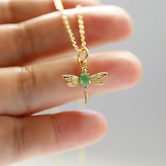 The dragonfly necklace is made of Cats eye green stone gold dragonfly pendants and a skinny gold-plated brass chain. Soft and simple. Great for gift , everyday or special occasions.  Your item will ship in a gift box. Please feel free to contact me if you have any questions. ♥ Length  14" - 20" ♥ Pendant Approx. 5/8" x 7/8" ♥ Gold plated over brass / Cats eye green stone / Cubic Zirconia ♥ Delivery Time Fast shipping within 1 - 3 days  ♥  See more Rudiana Accessories  Rudiana.etsy.com