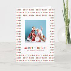 a merry and bright holiday card with an image of two children