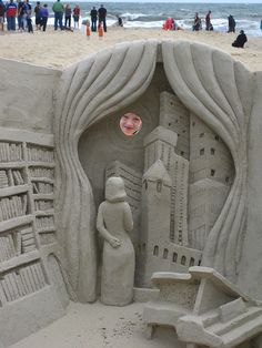 there is a sand castle made to look like it has been built on the beach