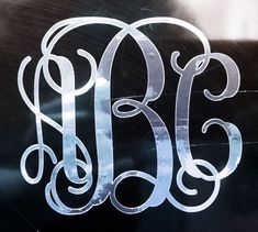 the monogrammed letters are white on black