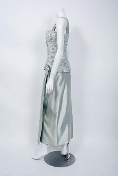 View this item and discover similar for sale at 1stDibs - Beautiful ice-blue beaded metallic silk and satin gown by the famous House of Maggy Rouff. This gorgeous garment dates back to their 1955 haute couture 1960s Wedding Dresses, 1940s Wedding Dress, Pink Silk Dress, 1950s Outfits, One Shoulder Gown, Satin Gown, White Gowns, Best Wear, Designer Gowns