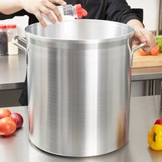 Perfect for preparing stocks, soups, and liquids, this 60 qt. Vollrath Wear-Ever Classic Select 68660 aluminum stock pot's tall and narrow shape allows liquids to bubble up through the food for superior flavor infusion!    Constructed of heavy gauge, impact-resistant 3004 aluminum with spot-welded handles for sturdiness, this stock pot is durably designed specifically for commercial kitchen use and ensures safe operation for your kitchen employees. Its smooth surface also allows for quick and ea Heirloom Kitchen, Bubble Up, Stock Pots, Sauce Pot, Steamed Vegetables, Hotel Supplies, Creamy Mashed Potatoes, Pot Designs, Stock Pot