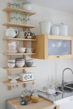 the kitchen is clean and ready to be used for cooking, baking, or as an appliance