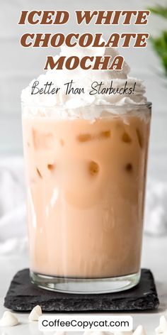 iced white chocolate mocha in a glass with whipped cream on top and text overlay