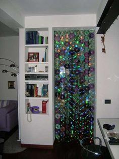 a room with a book shelf filled with lots of books