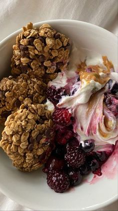 three different types of food in a white bowl