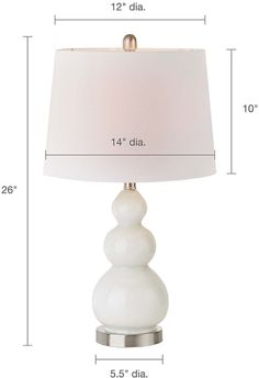 a white lamp with measurements for the base and lampshade on each one side