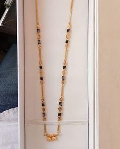 Karimani Mangalsutra, Mangalsutra Chain Designs Gold Long, Mangalsutra Chain Designs Gold, Mangalsutra Chain Designs, Chain Designs Gold, Mangalsutra Chain, Black Beads Mangalsutra, Black Beads Mangalsutra Design, Gold Mangalsutra Designs