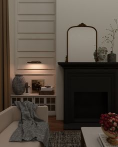 a living room filled with furniture and a mirror on top of a fireplace mantel