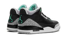 The Air Jordan 3 "Green Glow" is a colorway of Michael Jordan’s third signature shoe loosely inspired by the Jordan 3’s iconic “Black Cement” style, but with a twist.  Like the Jordan 3 “Black Cement,” the “Green Glow” features a black leather upper and grey elephant print details, but with light green accenting instead of the red accenting found on the “Black Cement. ” Specifically, Green Glow accenting appears on the eyelets, on the Jumpman branding on the tongue and heel, and on the “Jordan” logo on the outsole.  A black painted mudguard appears on the heel above the white midsole.  A small visible Air unit in the heel of the midsole gives the “Green Glow” a classic Jordan 3 look.  Release date: March 16, 2024 Retro 3 Outfits Jordan, Glow Outfits, Jordan 3 Black Cement, Glow Shoes, Jordan 3s, Green Jordans, Pretty Sneakers, Jordan Retro 3, Fly Shoes