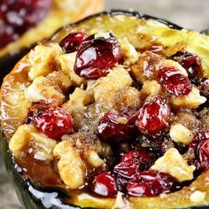 a close up of a plate of food with cranberry toppings on it