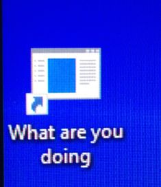 a screen with the words what are you doing on it and an image of a computer mouse