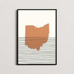 an orange and white poster with the shape of wisconsin on it's back ground