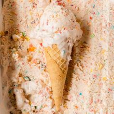 an ice cream cone with sprinkles on top