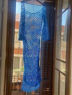 Handmade maxi dress with long bell sleeves in bright blue. 100% organic cotton. Great as a beach cover-up or over a slip dress! Size: M/L Length: 155 cm Sleeve length: 60 cm Width: 49 cm (but stretchy) Crochet Maxi Dress, Crochet Maxi, Beach Covers, Dress Clothes For Women, Bright Blue, Bell Sleeves, Slip Dress, Cover Up, Organic Cotton