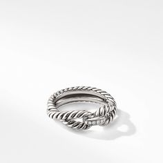 David Yurman's iconic Cable motif beautifully adorns a universal symbol or shape, creating a modern talisman meant to be collected, combined and treasured. Sterling Silver Pave diamonds, .05 total carat weight Ring, 8mm Style Number: R14038DSSADI45 David Yurman Ring, Loop Bands, Bridal Engagement Rings, Diamond Sizes, High Jewelry, David Yurman, Moissanite Engagement Ring, Moissanite Engagement, Pave Diamonds