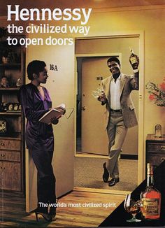 an advertisement for hennessy the civilized way to open doors, featuring two men in suits