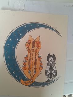 a drawing of two cats sitting on the moon