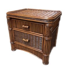 a brown wicker chest with two drawers and one drawer on the bottom, against a white background