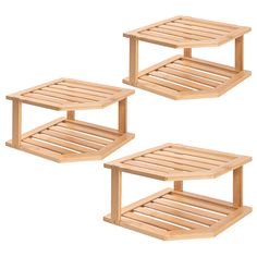 two wooden tables sitting side by side on top of each other with shelves underneath them