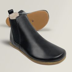 A wildly comfortable all-season boot, handcrafted by artisans using soft tumbled Nubuck leather. Bold, deep goring panels heighten the impact of this handsome Chelsea-styled minimal boot, for maximum versatility while providing a true “fits like a glove” feel. They feature a wide toe-box and zero-drop design to ensure a perfect, natural fit and a healthy gait. These classic grounding boots are handmade with natural materials that only get better with time and wear. Stay grounded. Chealse Boot Women, Wide Toe Box Boots, Barefoot Chelsea Boots, Chealse Boot, Grounding Shoes, Short Leather Boots, Stay Grounded, Chelsea Boots Women, Drop Design