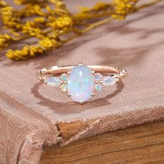 Oval cut Natural Opal ring Vintage Rose gold engagement ring Marquise cut Natural Opal ring 3/4 eternity twisted Bridal wedding promise ring Ring Specifications ➝Main Stone: Oval cut Natural Opal ➝Size: 6*8mm ➝Side Stones: Natural Opal  ➝Carats: 0.24ct ➝Band Width: 1.7mm ➝Band Thickness: 1.4mm All rings can be made of solid 10k/14k/18k rose gold, white gold, yellow gold. Need other gemstones or metal? please feel free to contact us. Ring Size All rings can be made into any size. If you have any Gold Engagement Ring Marquise, Engagement Ring Marquise Cut, Opal Wedding Ring Set, Engagement Ring Marquise, Opal Ring Vintage, Opal Engagement Ring Set, Rose Gold Opal Ring, Marquise Cut Engagement Ring, Rose Gold Engagement Ring Vintage