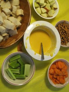 bowls filled with different types of food on top of a table