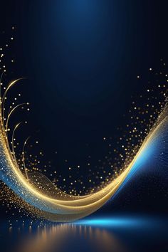 an abstract blue and gold background with sparkles in the air on a dark surface