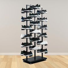 there is a rack with many pairs of shoes on it